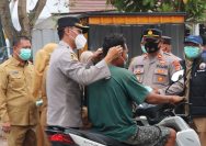 Kapolres AKBP Deddy Tinjau Dampak Erupsi Gunung Anak Krakatau, Bagikan Masker Kepada Warga Palas